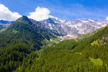 Fototapeta na wymiar Picturesque highland alpine landscape on Simplon Pass at summer day