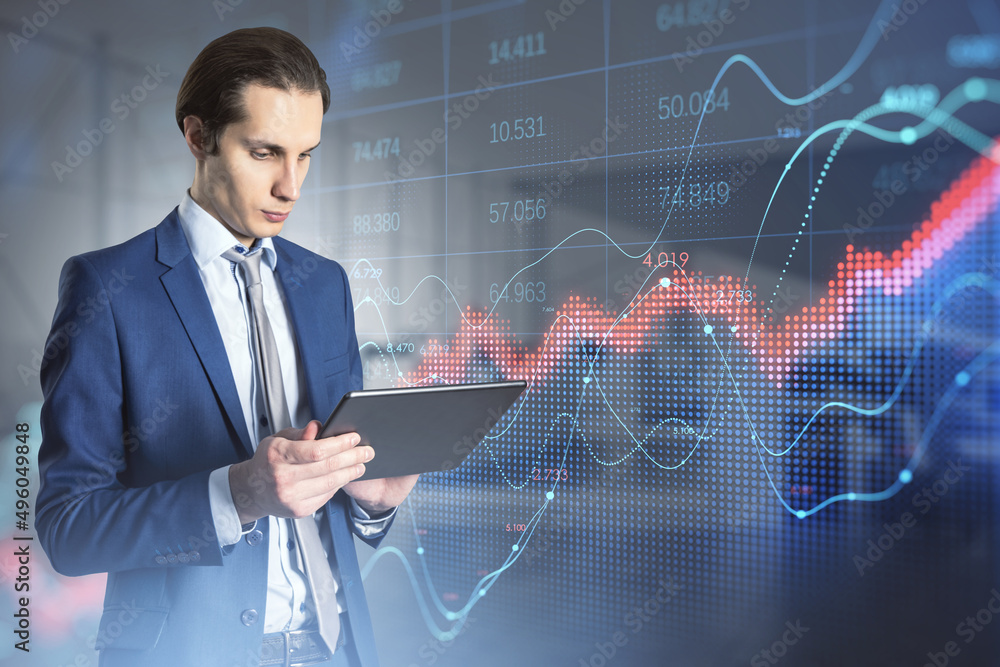 Poster attractive young white businessman using tablet with abstract red forex chart index on blurry office
