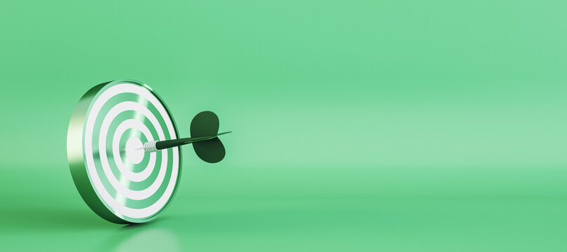 Wide Bullseye Target With Arrow On Green Background With Mock Up Place. Targeting And Marketing Concept. 3D Rendering.