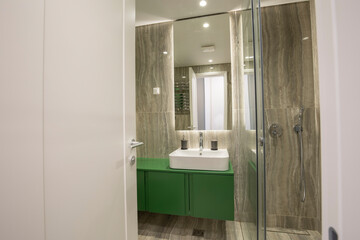 Interior of a bathroom with marble walls