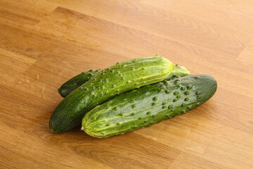 Fersh juicy green cucumbers heap