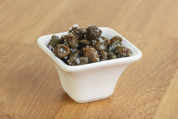 Salted marinated capers snack appetiser