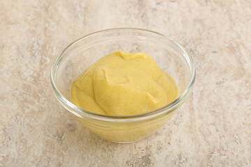 Organic mustard sauce in the bowl