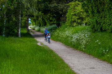 People walking and riding bicycles. Greenway hiking and cycling trail Stratford upon Avon...