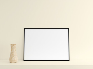 Customizable minimalist horizontal black poster or photo frame mockup on the podium table with vase