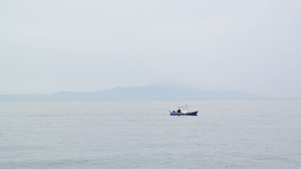Naklejka premium Seaside town and lighthouse in Canakkale, Turkey