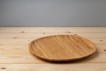 Wooden board for food on wooden background