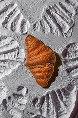 Poster of croissant in flour with croissant texture prints