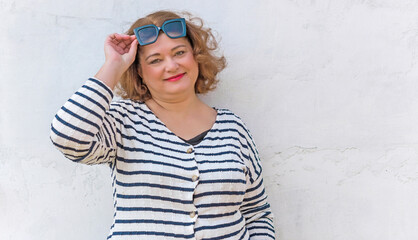 Plus size European mature woman with a good mood, enjoy the life, walks. Life of people xl size,...