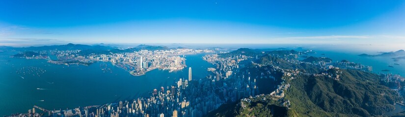 Panorama of Hong Kong Island from the peak, commercial center downtown surrounded by mountains