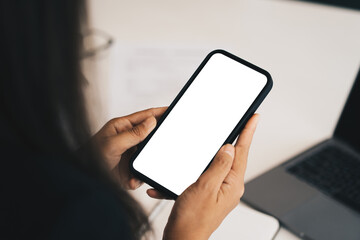 Woman showing smartphone with blank screen for advertise.
