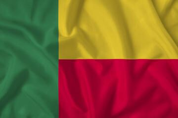 Benin flag with fabric texture. Close up shot, background