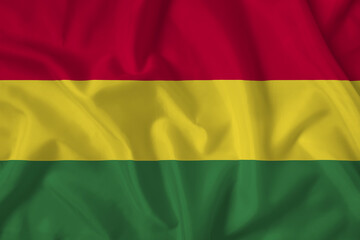 Obraz premium Bolivia flag with fabric texture. Close up shot, background