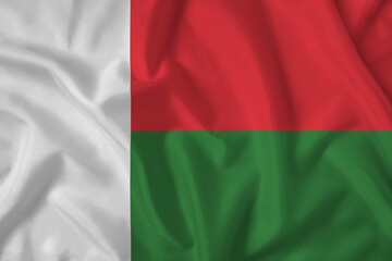 Madagascar flag with fabric texture. Close up shot, background