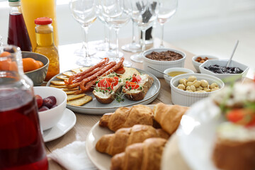 Brunch table setting with different delicious food indoors