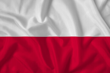 Poland flag with fabric texture. Close up shot, background