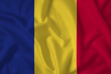 Obraz premium Romania flag with fabric texture. Close up shot, background