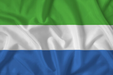 SierRa Leone flag with fabric texture. Close up shot, background