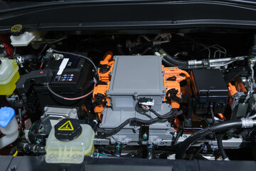 Undercarriage parts of a car, showing materials, wheels, shocks, engines