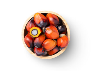 Oil palm fruit and cut in half sliced in wooden bowl isolated on white background. Top view. Flat lay.