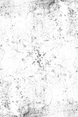 White concrete wall surface with scattered dark grunge texture