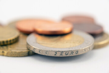 Euro coins on white backgound from close-up