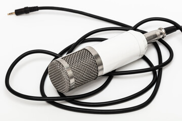 metal microphone on white background