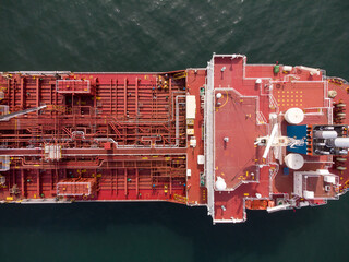 Large general cargo ship tanker bulk carrier, Top down aerial view.