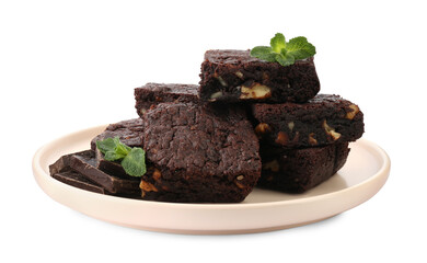 Delicious chocolate brownies with nuts and fresh mint on white background