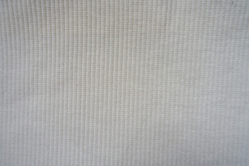 Fototapeta na wymiar Top view of white cotton and polyester ribbed fabric