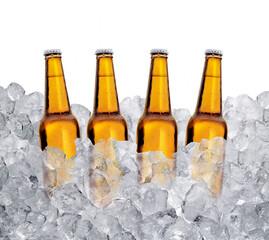Three bottles of beer on ice cubes Isolated on white background