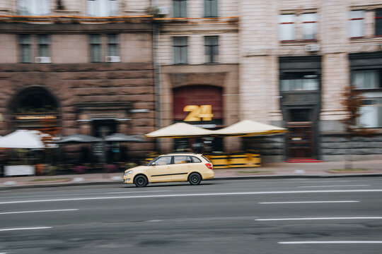 Ukraine, Kyiv - 2 August 2021: Yellow Skoda Fabia car moving on the street. Editorial