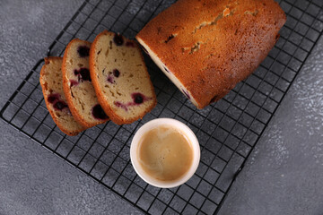 Cup of espresso and homemade currant muffin