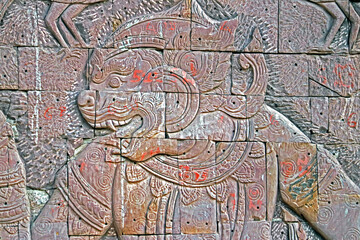 Traditional Thai style wood craving on the wall of church in Thai temple