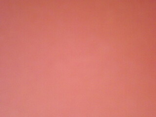 Burgundy, crimson, red, pink paper surface with a clear separation of colors as a background