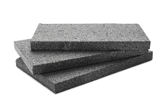 Stack of grey styrofoam sheets on white background