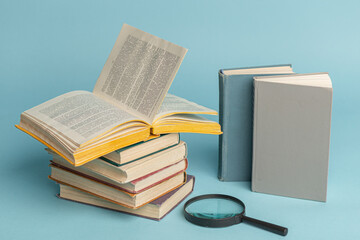 Open old book on the table. It is time for education and therefore you need to go back to school. World books day