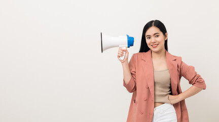 Shout out loud with megaphone. Young beautiful asian woman  announces with a voice about promotions...