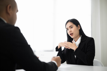 Business woman  to greet a HR staff before a job interview to apply for a job. Happy woman seeker or insurance broker presenting a business deal. Smart asian woman sending resume.