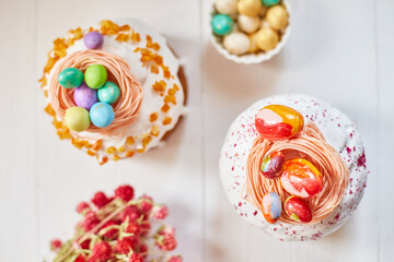 Easter cake with chocolate eggs decoration, on white wooden table the holiday, Happy Easter Holiday.