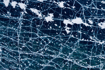 Alone Woman tourist background texture of blue ice with cracks, aerial top view of Lake Baikal