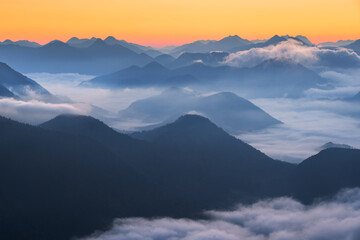 Fototapeta na wymiar A misty morning in the bavarian alps.