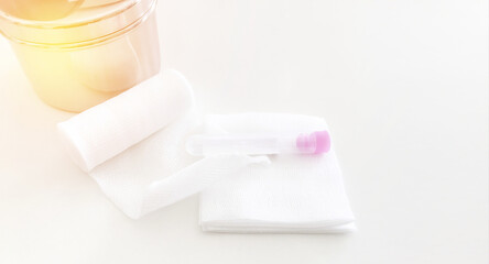 swab ,gauaze ,roll bandage and blood tube with copy space in medical concept