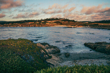 sunset over the beach in monterey