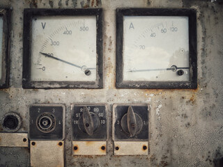 Rusty old large voltmeter and amperemeter
