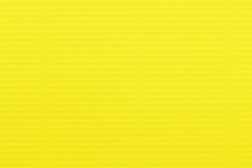 Texture of yellow paper to be used as a background.