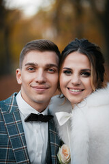 Stylish happy newlyweds, elegant satisfied bride. Newlyweds gathering