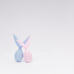 Naklejka na ściany i meble Easter bunny paper gift egg wrapping diy idea. Minimal Easter concept. With copy space.