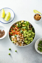 Healthy bowl with chicken and avocado
