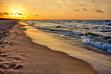 Fototapeta na wymiar Shore at sunset, sandy beach - Baltic Sea, Poland